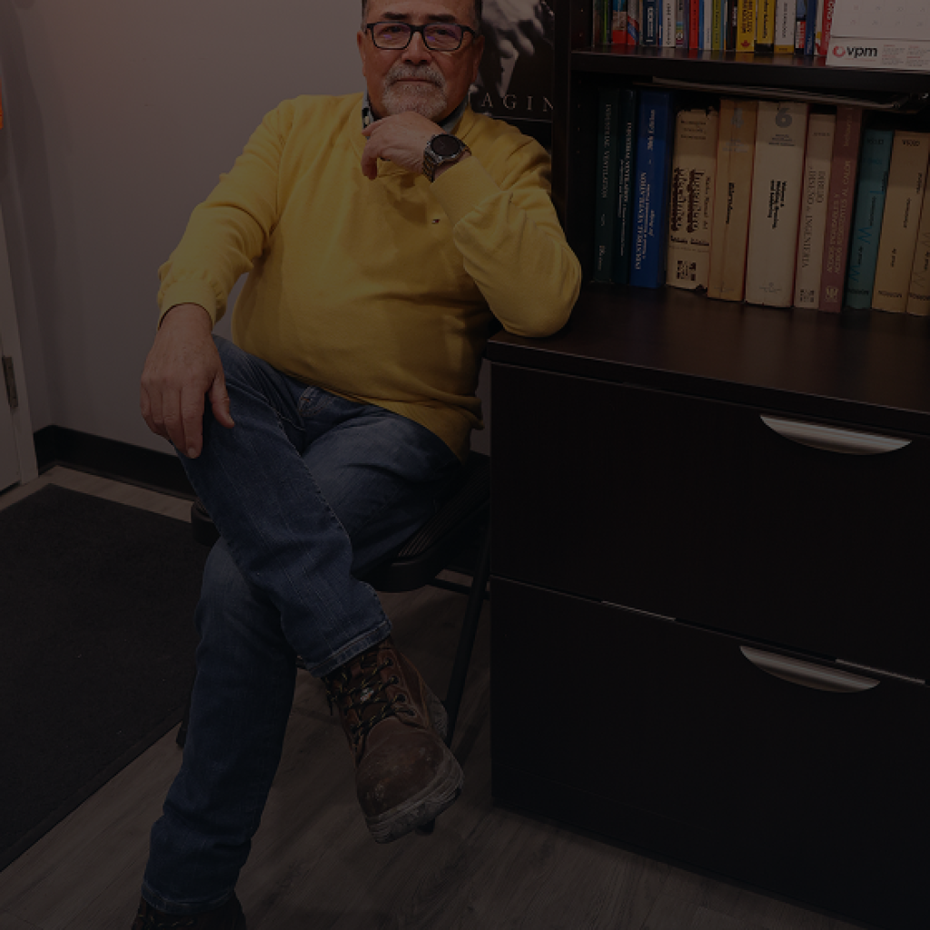 William Vallejo - ICMS owner sitting in his office.
